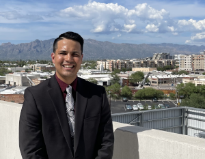 Dominic Rizzi in front of the Tucson Skyline and the Santa Catalina Mountains